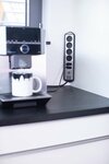 estilo corner extension lead with USB charging function 6-way 4x earthed sockets & 2x Euro silver black