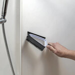 Mini dustpan and brush with silicone bristles and wiper